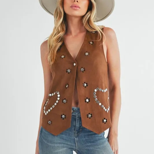 Woman wearing a Cowgirls Rivet Detail Suede Vest in brown color